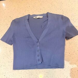 Women's short-sleeve button-up top. Very cute!